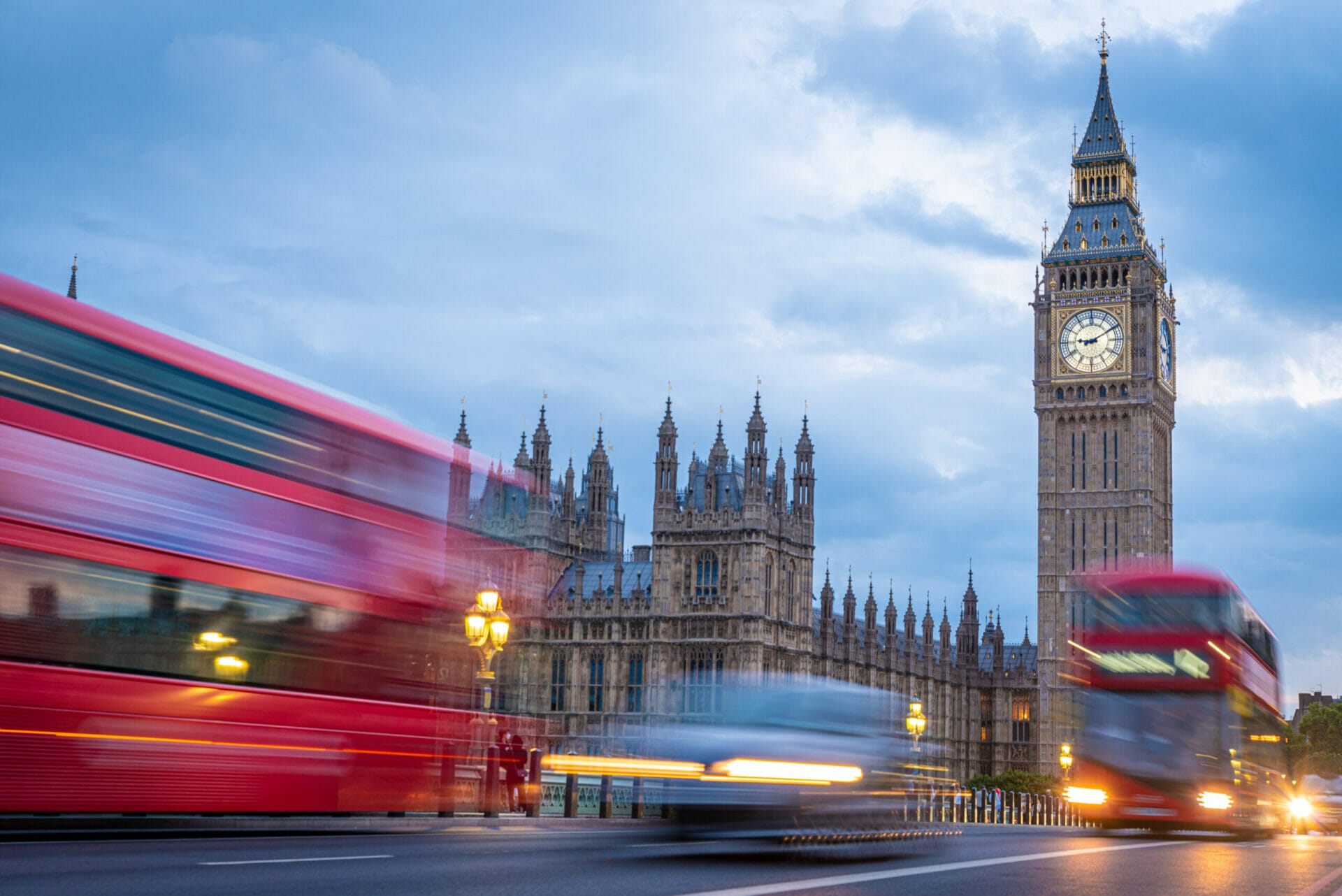 Red Double Decker Buses at Big Ben at Blue Hour in London